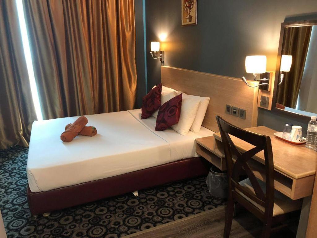 The Room Hotel Miri Kamer foto